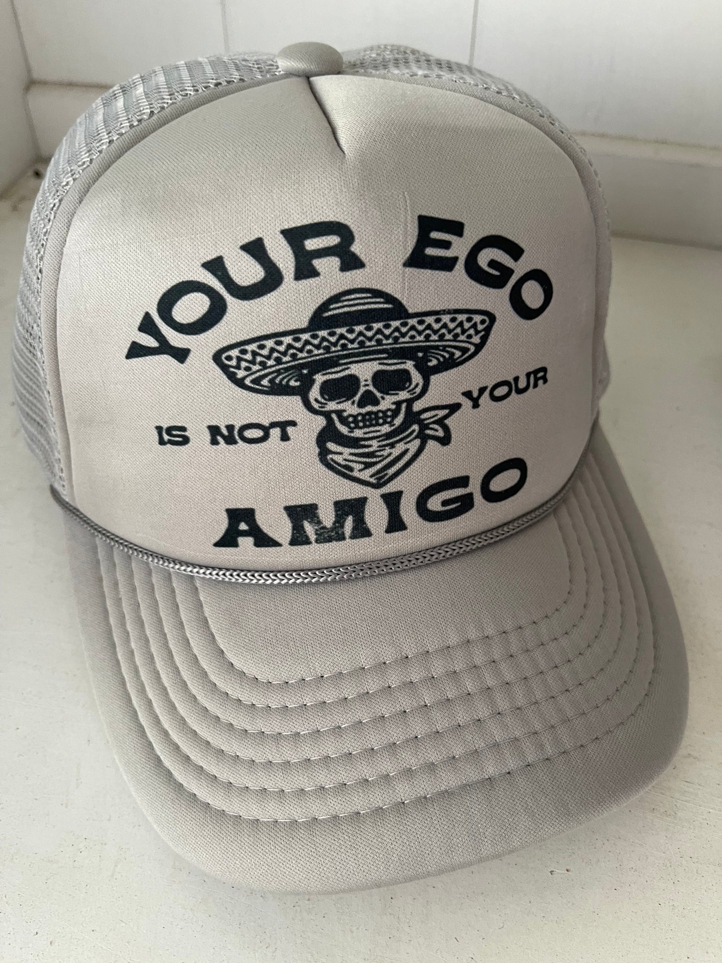 Your ego is not your amigo trucker hat