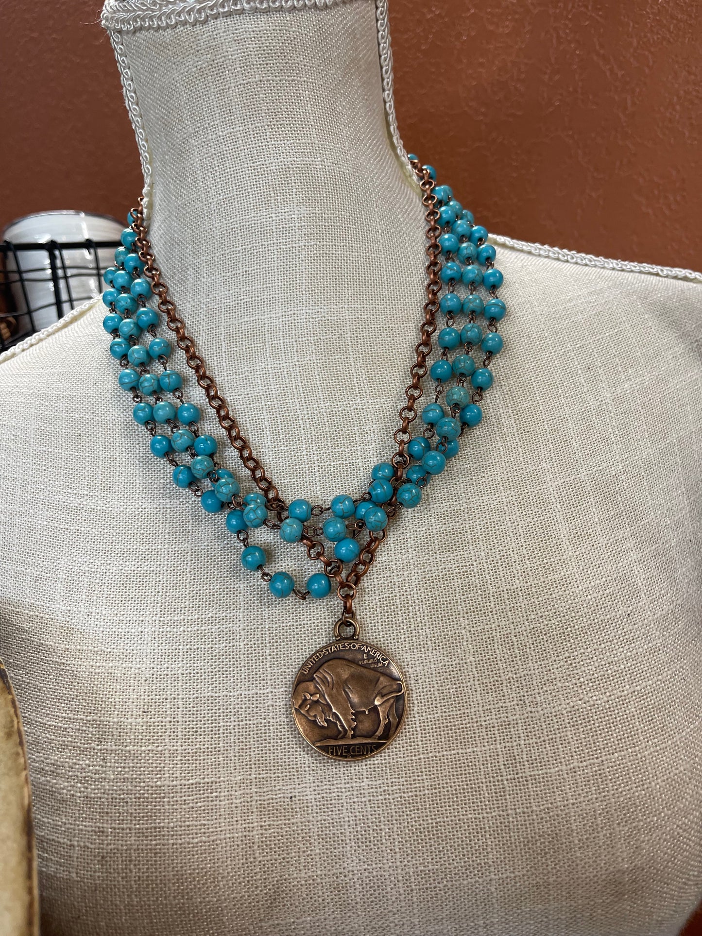 TURQUOISE TRIPLE STRAND NECKLACE